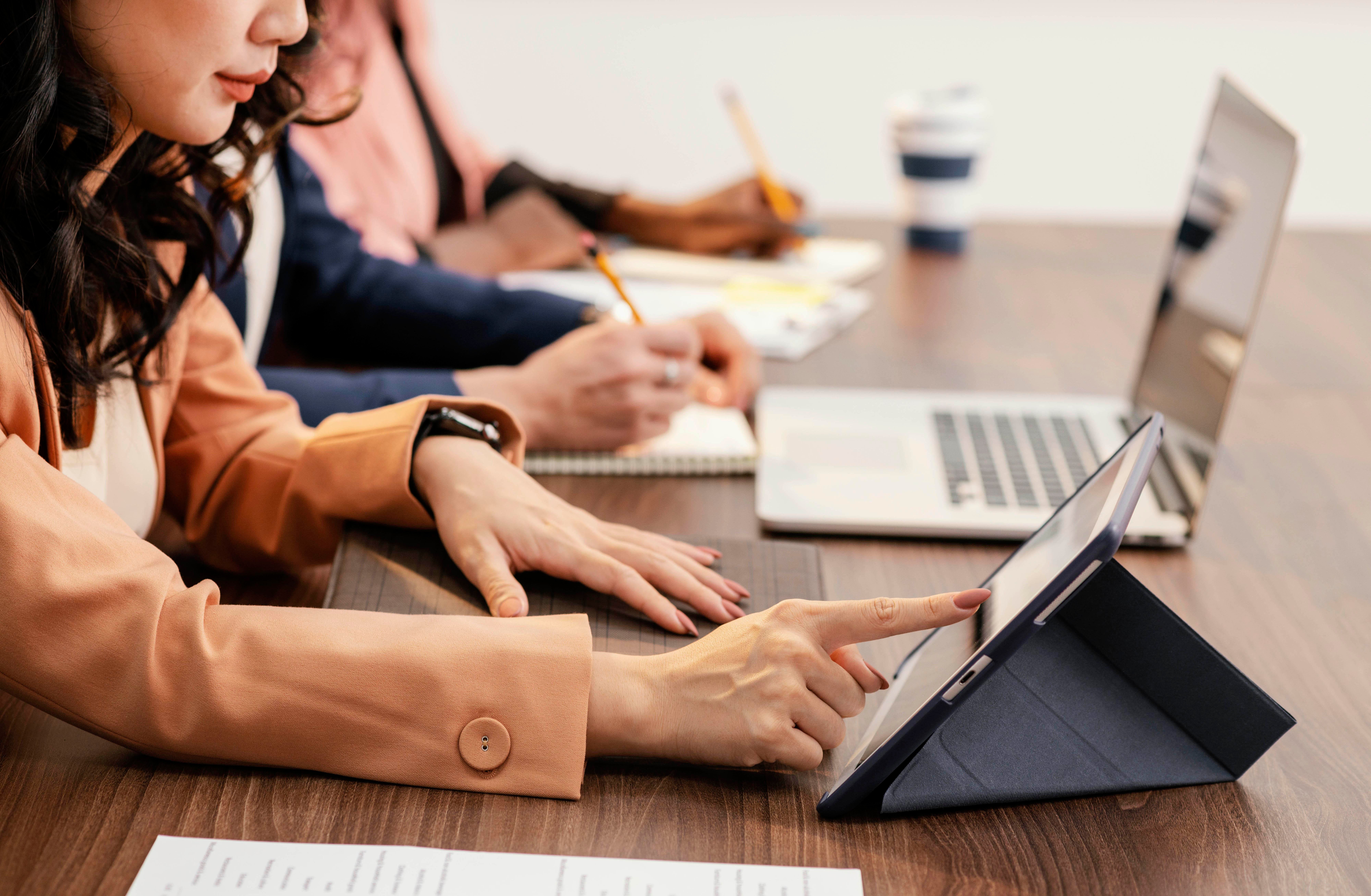 close-up-women-working-with-devices