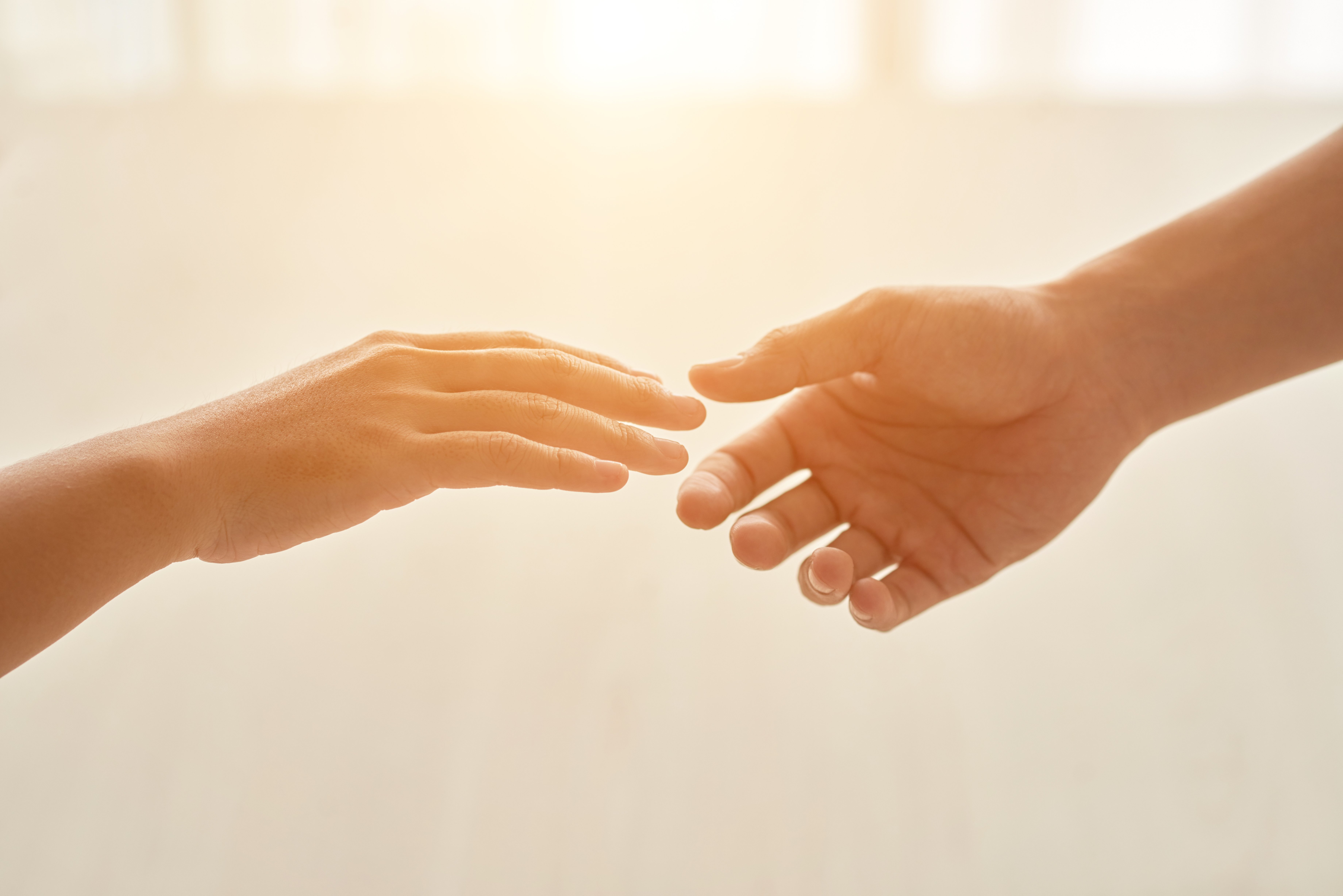 love-concept-represented-by-hands-extended-each-other